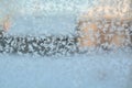 Winter frozen window snow hoar frost snowflakes glass pattern Royalty Free Stock Photo