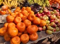 Winter fruits kept in retail storefront for sale in bengal india. orange, apple, banana and other seasonal fruits kept together