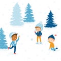 Happy children during winter time. Kids having fun in winter. Boys playing snowball fight outside Royalty Free Stock Photo