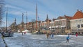 Winter fun in the city Dokkum on the canals in the Netherlands Royalty Free Stock Photo