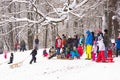 Winter fun, snow, family sledding at winter time. Royalty Free Stock Photo