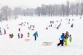 Winter fun, snow, family sledding at winter time. Royalty Free Stock Photo