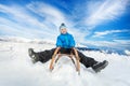 Winter fun in snow mountains boy on sledge Royalty Free Stock Photo