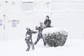 Winter Fun. Three teenagers play in the snowstorm in Lexington, MA on January 23, 2023