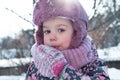 Winter, games, family, childhood concepts - close-up portrait authentic little preschool minor 3-4 years girl in pink Royalty Free Stock Photo