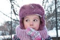 Winter, games, family, childhood concepts - close-up portrait authentic little preschool minor 3-4 years girl in pink Royalty Free Stock Photo