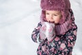 Winter, games, family, childhood concepts - close-up portrait authentic little preschool minor 3-4 years girl in pink Royalty Free Stock Photo