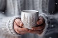 Winter gift design inspiration, girl holding white mug in close-up