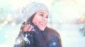 Winter girl portrait. Beauty joyful model girl enjoying nature, having fun in winter park. Beautiful young woman outdoors