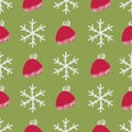 Winter hats and snowflakes seamless vector pattern