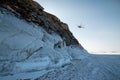 In winter, a helicopter landing on Baikal Royalty Free Stock Photo