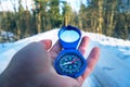 Winter hiking, explaining the ground with compass Royalty Free Stock Photo