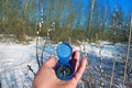 Winter hiking, explaining the ground with compass Royalty Free Stock Photo