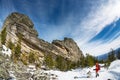 Winter Hiking in the mountains with a backpack and snowshoes