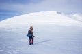 Winter hiking in the mountains .