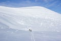 Winter hiking in the mountains .