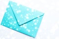 Winter holiday blank paper envelopes on marble with shiny snow flatlay background, love letter or Christmas mail card design