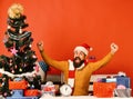 Winter holiday and celebration concept. Santa presents decorated Christmas tree