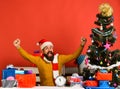 Winter holiday and celebration concept. Santa presents decorated Christmas tree