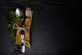 Winter holiday dinner plate decoration on black wood background. table set with a winter, Christmas decoration. Winter holiday the Royalty Free Stock Photo