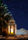 Winter Holiday Scene With Glowing Lantern Royalty Free Stock Photo