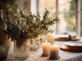 Winter holiday season festive dining table decoration with candles and beautiful tableware, elegant table decor
