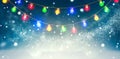 Winter holiday snow background decorated with colorful light bulbs garland. Snowflakes. Christmas and New Year abstract backdrop Royalty Free Stock Photo