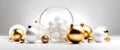 Winter holiday wallpaper. Festive white and gold Christmas ornaments and baubles. Empty glass snow ball White Christmas Royalty Free Stock Photo