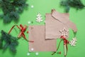 Winter holidays background. Gift wrapping and decorating christmas present, boxes in craft paper with satin silver ribbon. Top vie