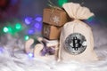 Winter holidays background: the sack with bitcoins.