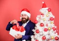 Winter holidays. Boxing day. Christmas party. Sharing kindness and happiness. Prepare gifts for everyone. Man bearded Royalty Free Stock Photo