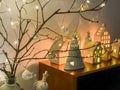 Winter holidays christmas home decor decorated by glowing lights and house candlesticks