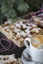 Winter, holidays. Christmas table, cookies in the form of snowflakes close-up. coffee and cookies