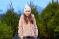 Little girl choosing christmas tree at market Royalty Free Stock Photo