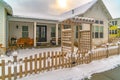 Winter home with pergola on the wooden gate Royalty Free Stock Photo