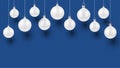 Winter horizontal blue background with white realistic baubles