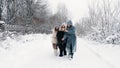 winter horse ride. horseback riding at winter. family horseback ride on snowy winter day. Happy cutie, little girl is Royalty Free Stock Photo