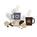 Winter hygge concept with hot drinks, dried orange, gingerbread cookies, cinnamon and anise on plate or tray