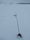 Winter Ice Fishing Lure Balancer, a long pole for ice fishing Royalty Free Stock Photo