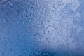 Winter ice pattern on the frozen window. Texture, background for inserting text. New Year theme. Winter. Cold. Royalty Free Stock Photo