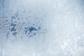 Winter ice pattern on the frozen window. Texture, background for inserting text. New Year theme. Winter. Cold. Royalty Free Stock Photo