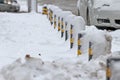 Winter. Ice. Snow. People walks a snowy icy road passing snowy cars on uncleaned icy street after a heavy snowfall. Unclea Royalty Free Stock Photo