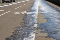 Winter infinite perspective of bicycle lanes, insecure pavement and street