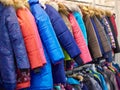 Winter jackets on hanger in store Royalty Free Stock Photo