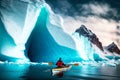 winter kayaking in antarctica against backdrop of huge iceberg