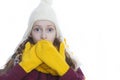 Winter Kids Concepts. Closeup Portrait of Surprised Caucasian Girl Posing in Winter Outfit With Pigtails Against White. Holding