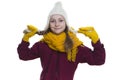 Winter Kids Concepts. Portrait of Smiling Positive Caucasian Girl Posing in Winter Outfit With Pigtails Against White in Studio