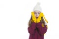 Winter Kids Concepts. Portrait of Surprised and Exclaiming Caucasian Girl Posing in Winter Outfit With Pigtails Against White in