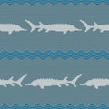 Winter Knitted woolen seamless pattern with sturgeons in vintage blue tones