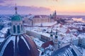 Winter in Krakow Poland aerial view. Saints Peter and Paul Church dome, St. Andrew Church bell towers, and Wawel Royal Castle Royalty Free Stock Photo